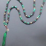 Collier Mala avec Pompon de 108 perles en Malachite et Pierre de Lave - Symbole "Om" plaqué Or