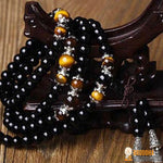 Bracelet Mala Bouddhiste Obsidienne/Oeil de Tigre